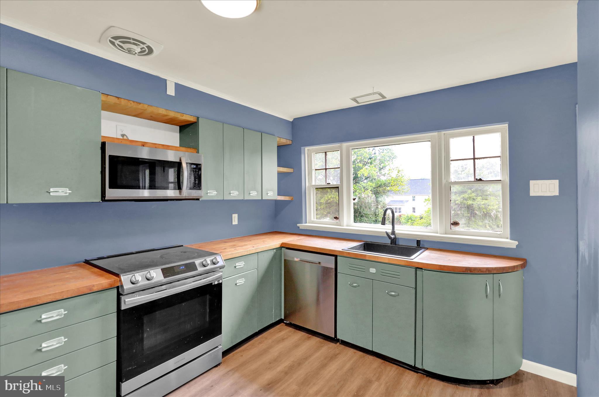 434 East Moyer Road Pottstown, PA 19464 - Photo 13 of 38 a kitchen that has a sink and a stove