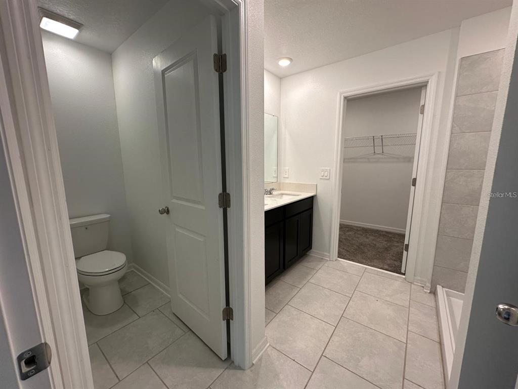 669 Reggie Road Winter Haven, FL 33859 - Photo 14 of 23 a bathroom with a sink and a toilet