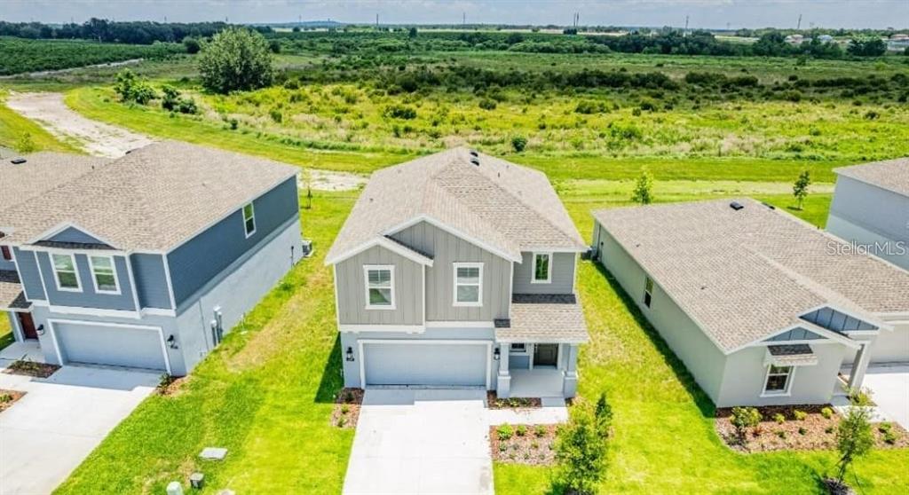 669 Reggie Road Winter Haven, FL 33859 - Photo 21 of 23 an aerial view of a house with a ocean view