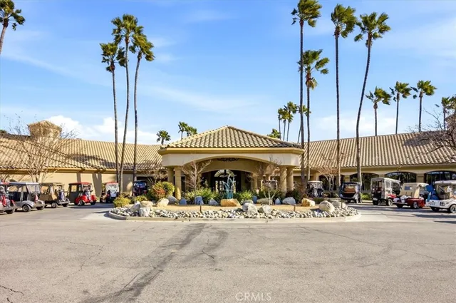 a group of cars parked in front of a building