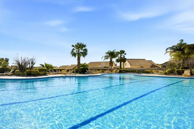 a view of a golf course with a lake