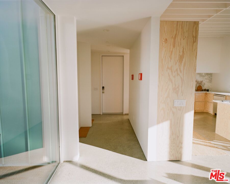7825 Conejo Avenue Joshua Tree, CA 92252 - Photo 9 of 34 a view of a hallway with a elevator