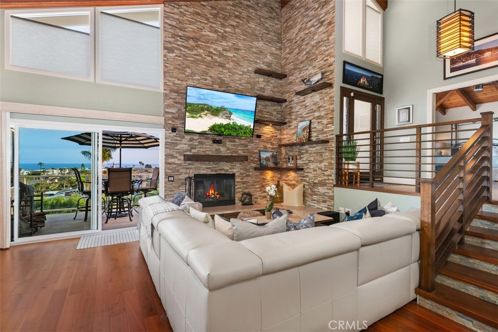 33901 Orilla Road Dana Point, CA 92629 - Photo 20 of 57 a living room with furniture and a fireplace