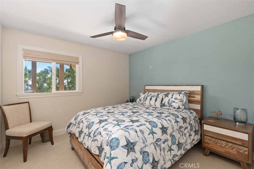 33901 Orilla Road Dana Point, CA 92629 - Photo 30 of 57 Guest room with hardwood built ins in the closet and natural fiber blinds