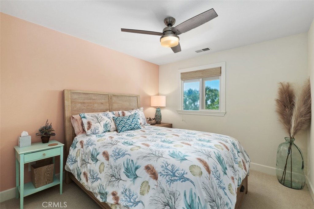 33901 Orilla Road Dana Point, CA 92629 - Photo 31 of 57 a bedroom with a bed and a window