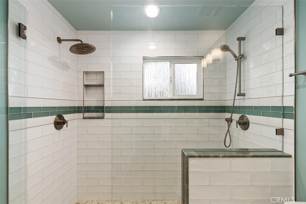 33901 Orilla Road Dana Point, CA 92629 - Photo 32 of 57 Large oversized shower in guest bath with custom sea glass tile and stone work