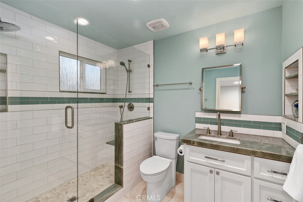 33901 Orilla Road Dana Point, CA 92629 - Photo 33 of 57 Beautiful full guest bath with custom sea glass tile stone work