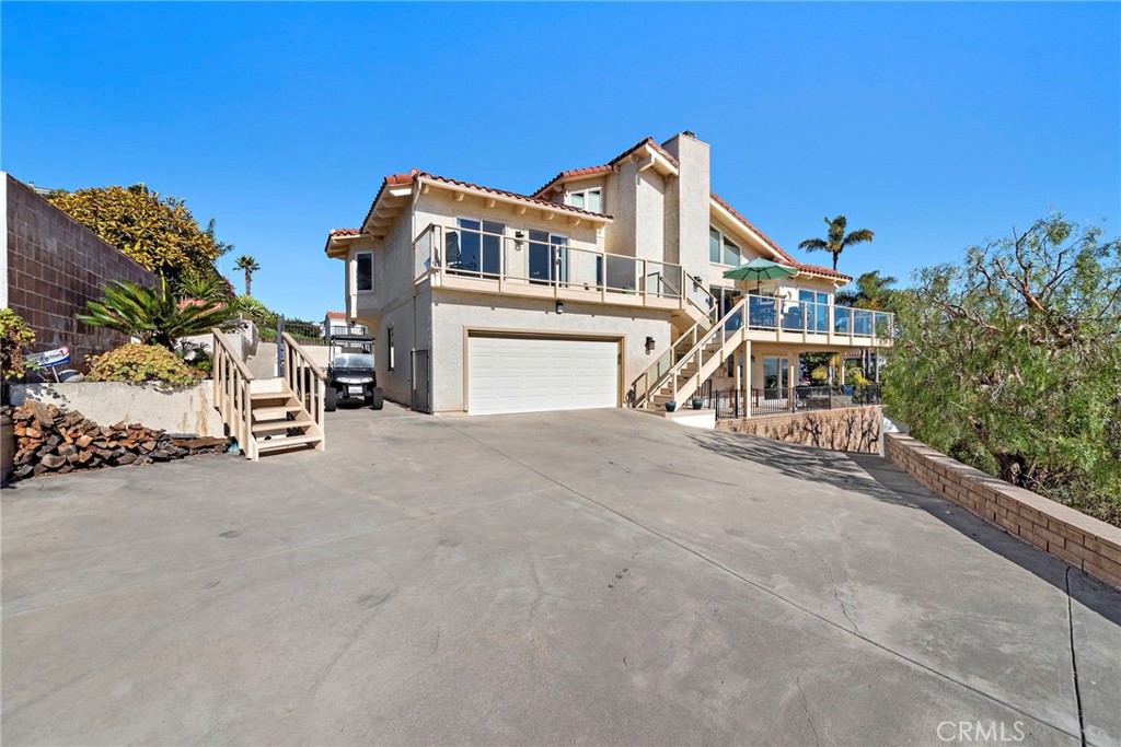 33901 Orilla Road Dana Point, CA 92629 - Photo 45 of 57 Huge flat area at top of driveway. Side yard parking area could be left as is for additional parking, or create yard/hot tub space over here. Top of driveway large flat area, investigate with the city if an ADU could be built here
