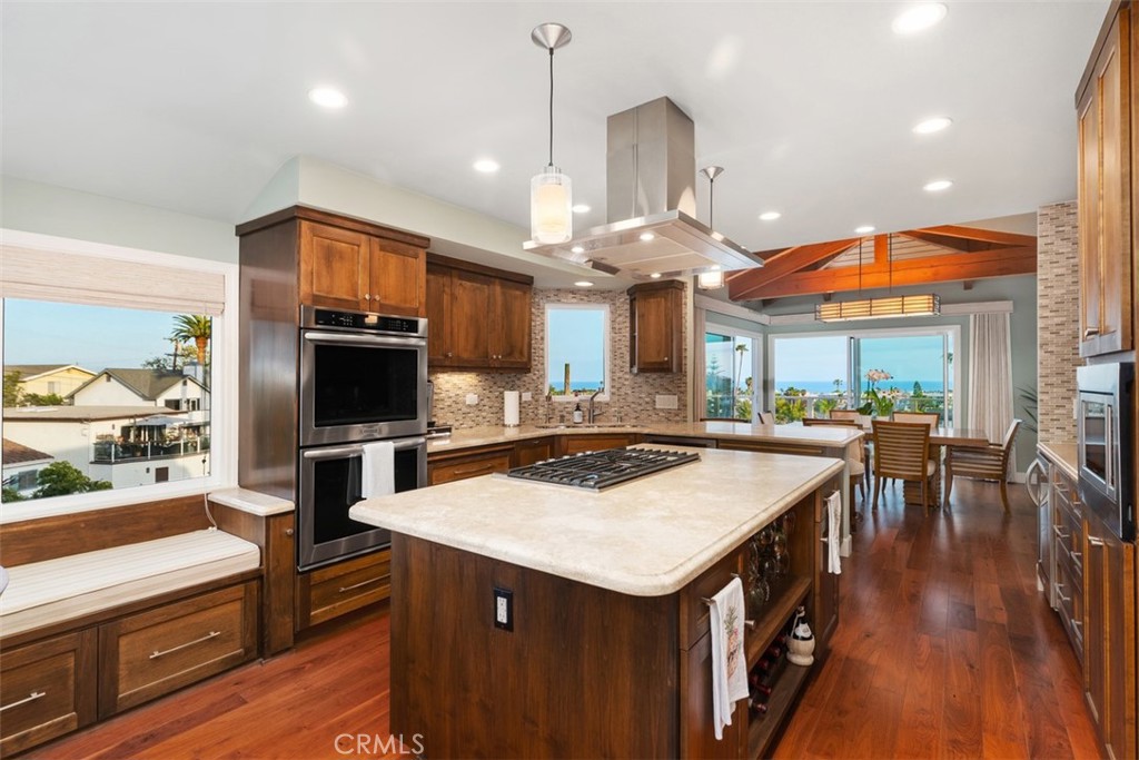 33901 Orilla Road Dana Point, CA 92629 - Photo 10 of 57 a kitchen with stainless steel appliances granite countertop a sink a stove and a refrigerator