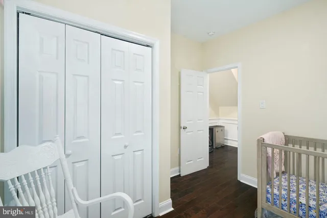 a view of entryway with wooden floor