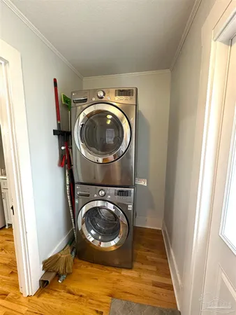 a view of washer and dryer in a small bathroom