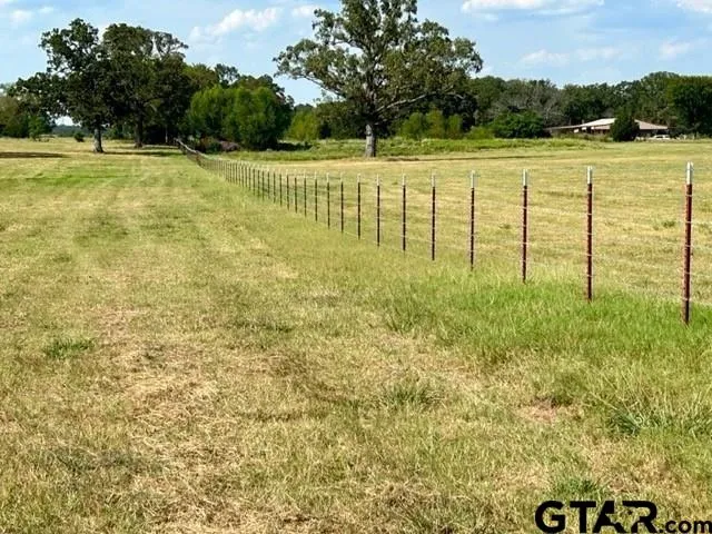a view of swimming pool with an outdoor space and seating area