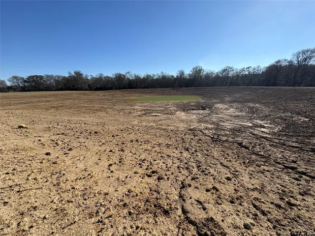a view of outside space with a lake view