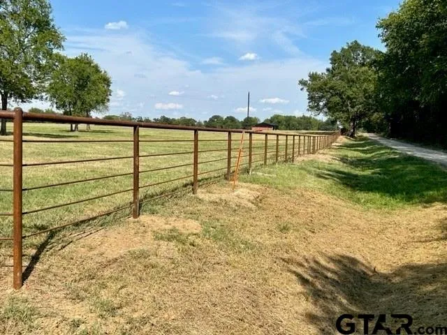 a view of swimming pool with a yard