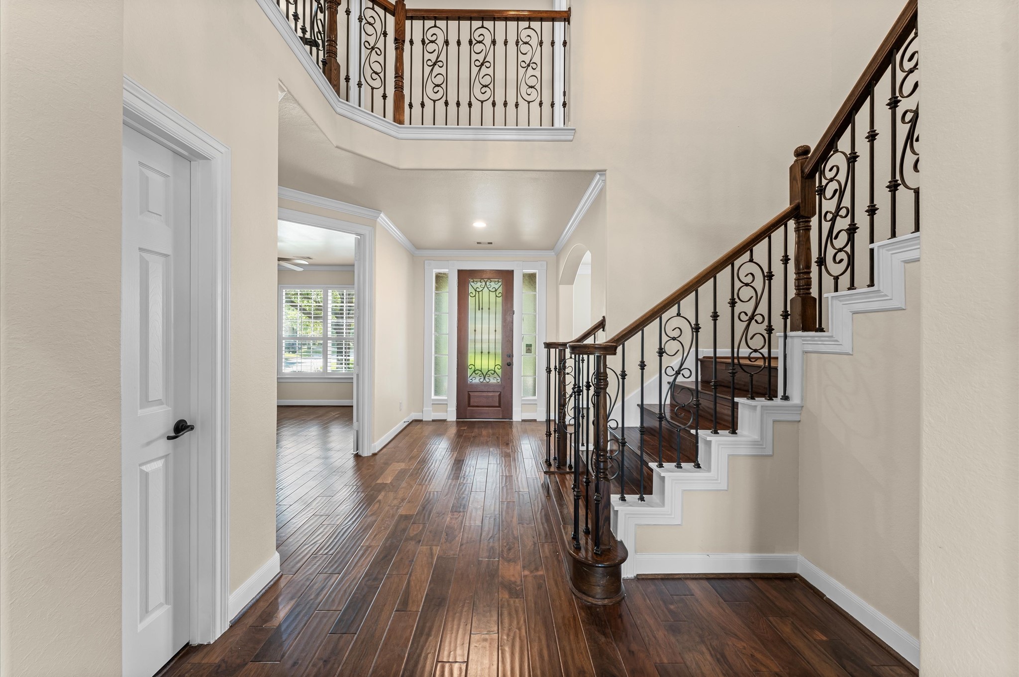 7 North Beech Springs Circle Spring, TX 77389 - Photo 7 of 50 a view of entryway and hall with wooden floor