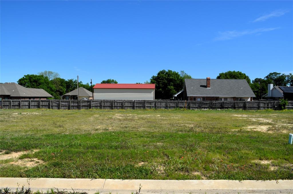 312 Preston Road Mabank, TX 75147 - Photo 1 of 4 a view of an outdoor space and swimming pool