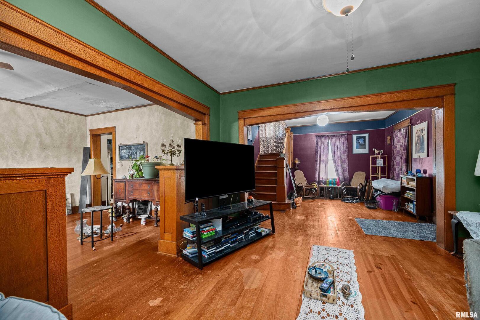 415 Southwest 4th Avenue Galva, IL 61434 - Photo 24 of 38 a living room with furniture and a flat screen tv