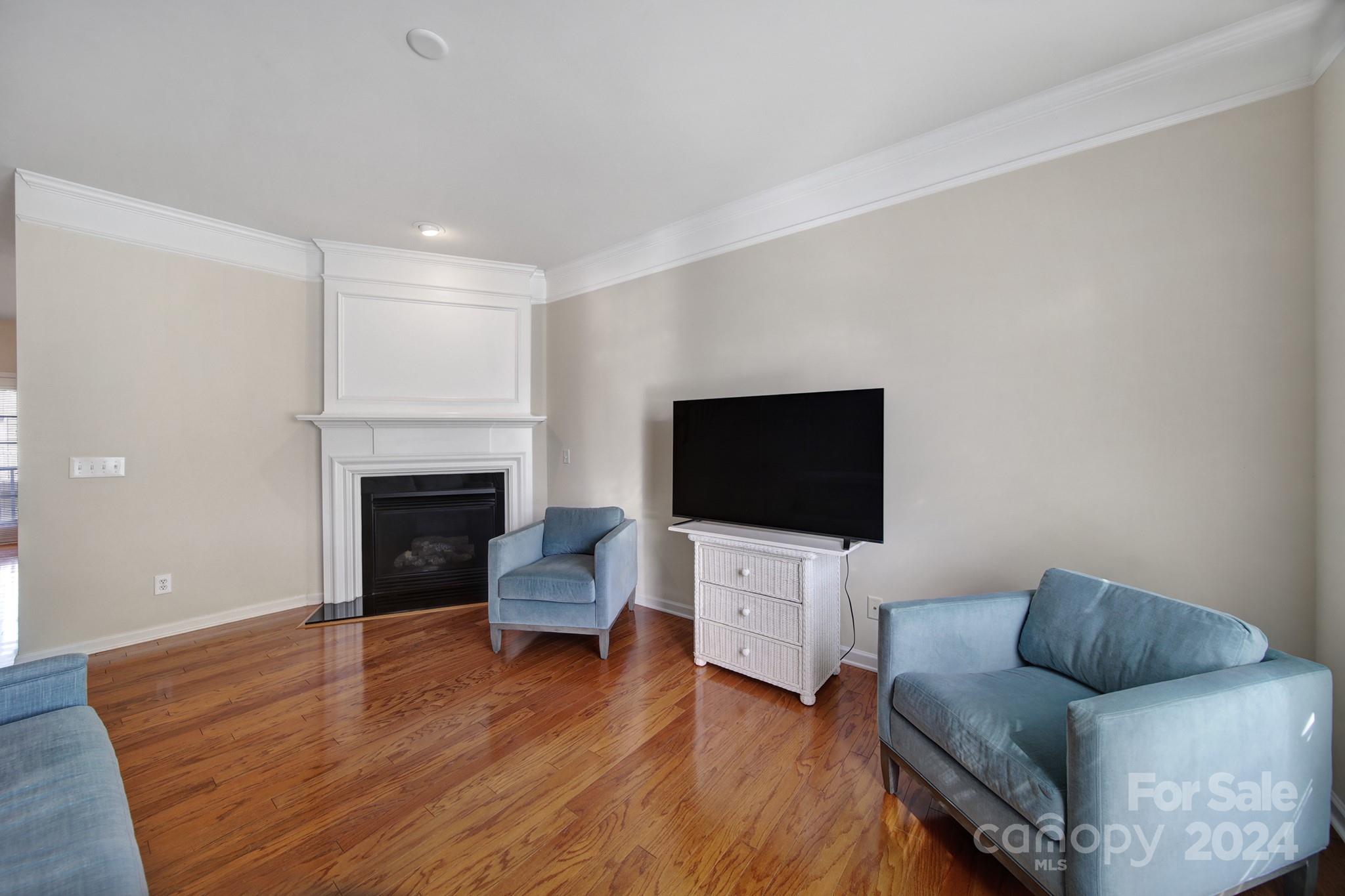 807 Granby Drive Fort Mill, SC 29708 - Photo 6 of 33 a living room with furniture and a flat screen tv