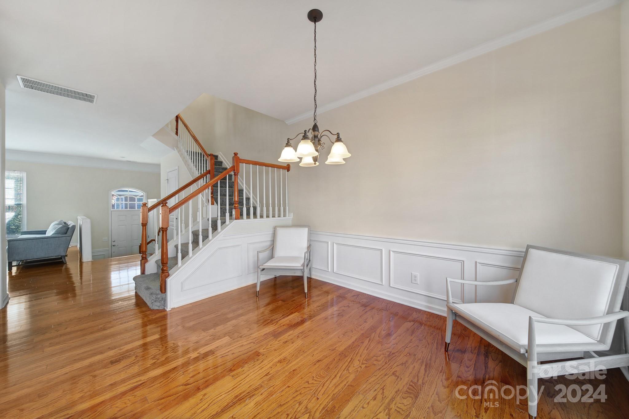 807 Granby Drive Fort Mill, SC 29708 - Photo 10 of 33 a view of a room with lots of furniture and wooden floor