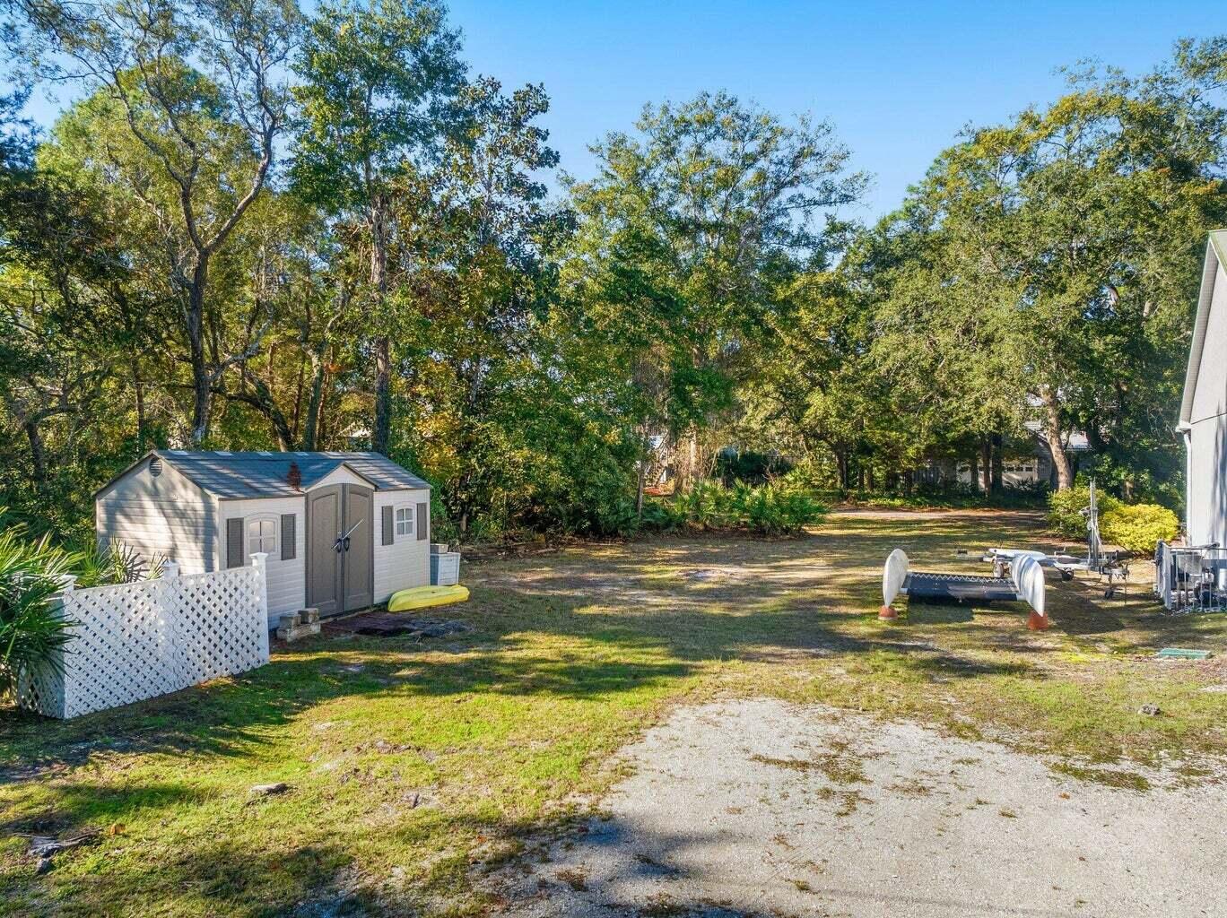 49 Wish Lane Santa Rosa Beach, FL 32459 - Photo 19 of 26 a view of a house with swimming pool and sitting area