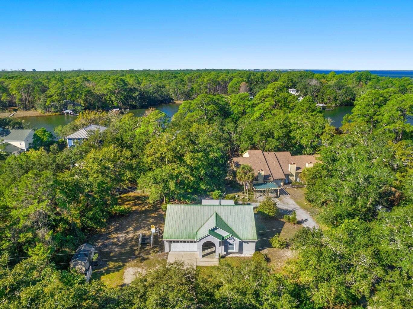 49 Wish Lane Santa Rosa Beach, FL 32459 - Photo 23 of 26 a view of a lake with a yard