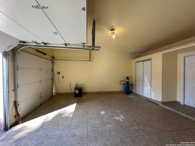 a view of a hallway with windows