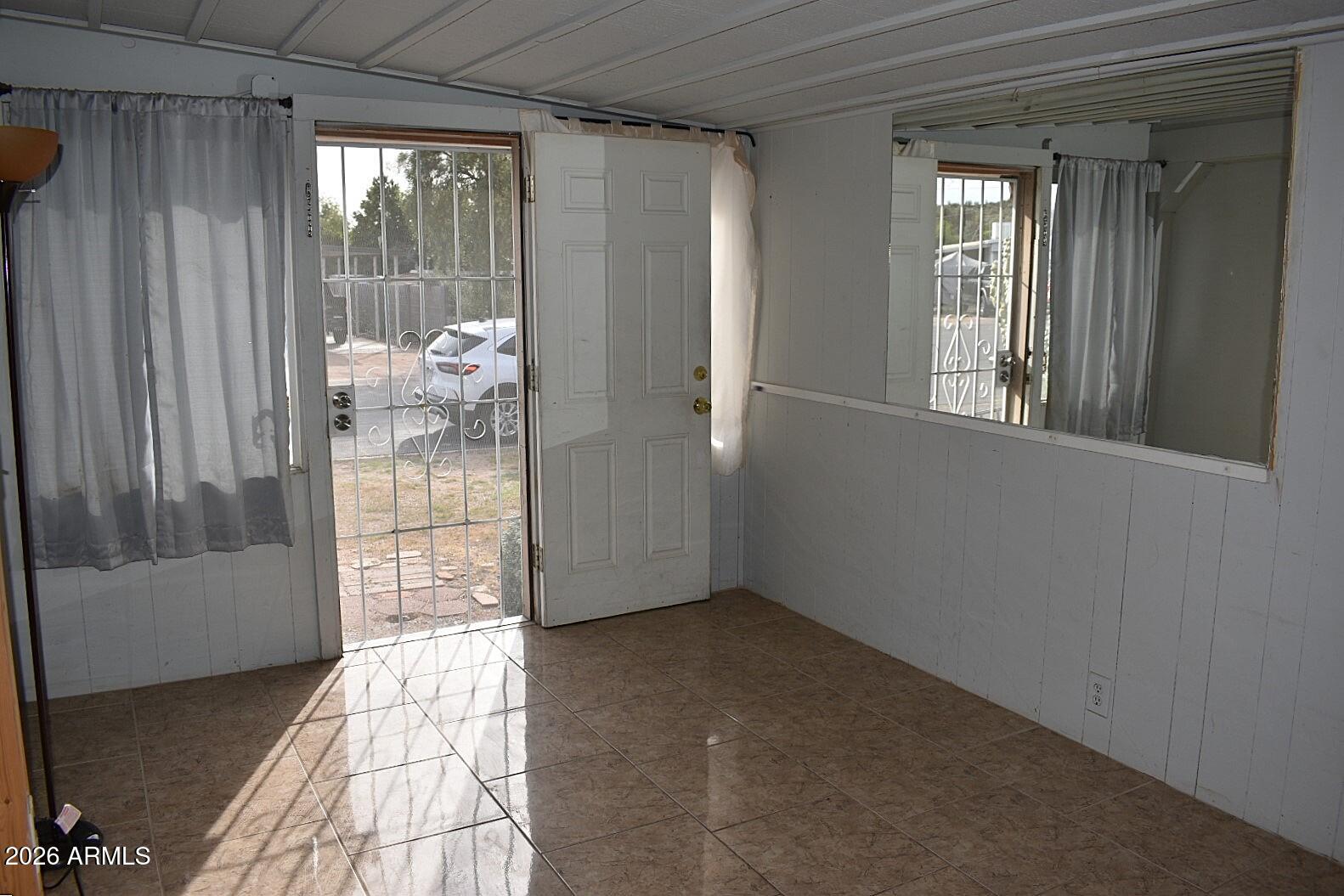 8138 Butte Street Mesa, AZ 85207 - Photo 8 of 27 a view of an empty room and window