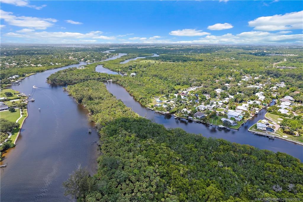 815 Southwest Rustic Circle Stuart, FL 34997 - Photo 2 of 20 a view of a city with an ocean