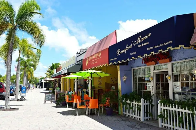a view of street with sitting area