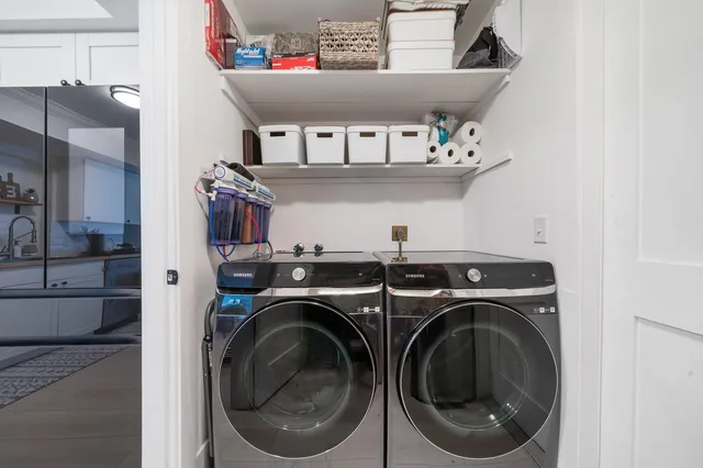 a utility room with dryer and washer