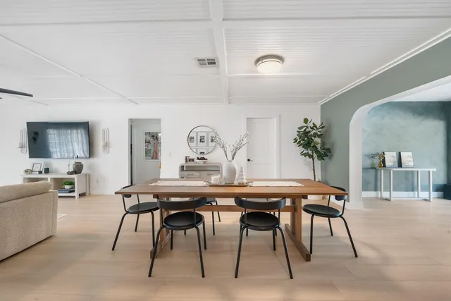 a view of a dining room with furniture