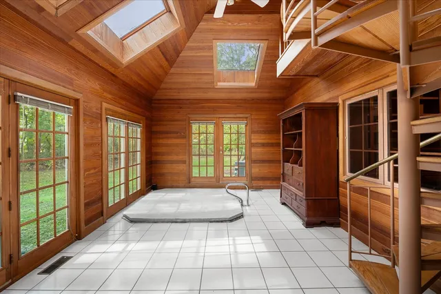 a view of front door and bedroom