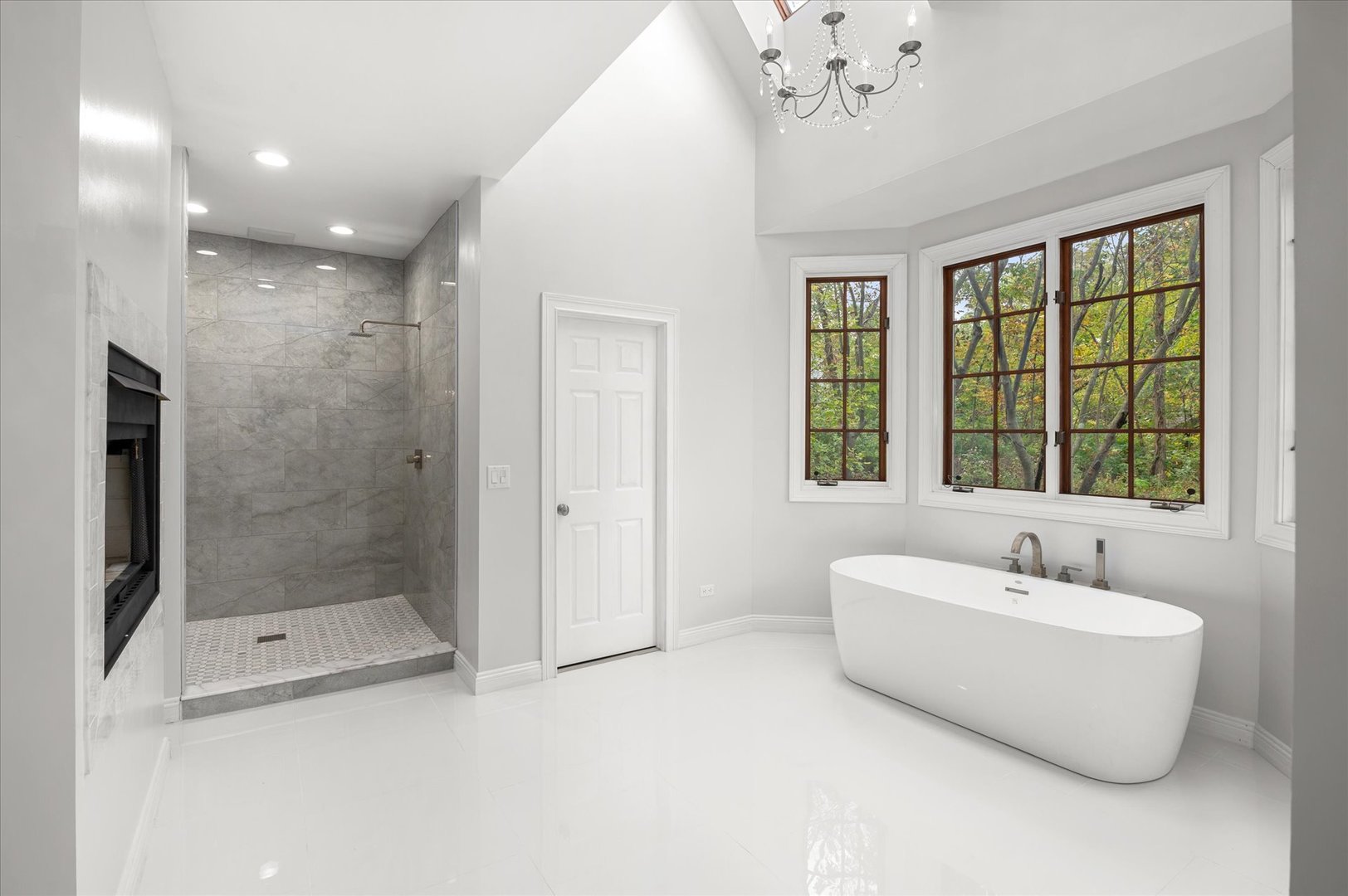 5N847 Surrey Road Wayne, IL 60184 - Photo 21 of 45 a bathroom with a bathtub and a shower