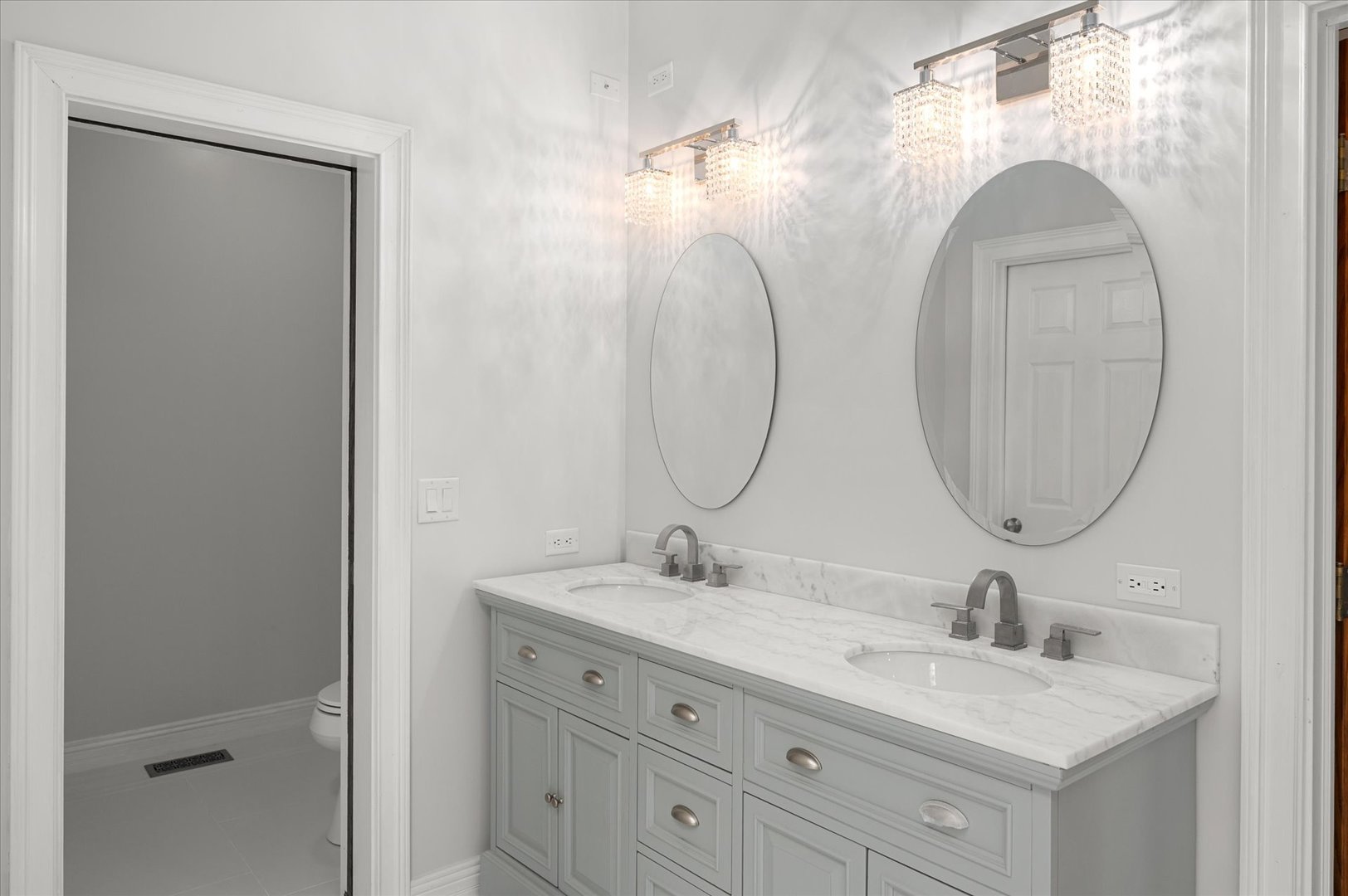 5N847 Surrey Road Wayne, IL 60184 - Photo 23 of 45 a bathroom with a double vanity sink and a mirror