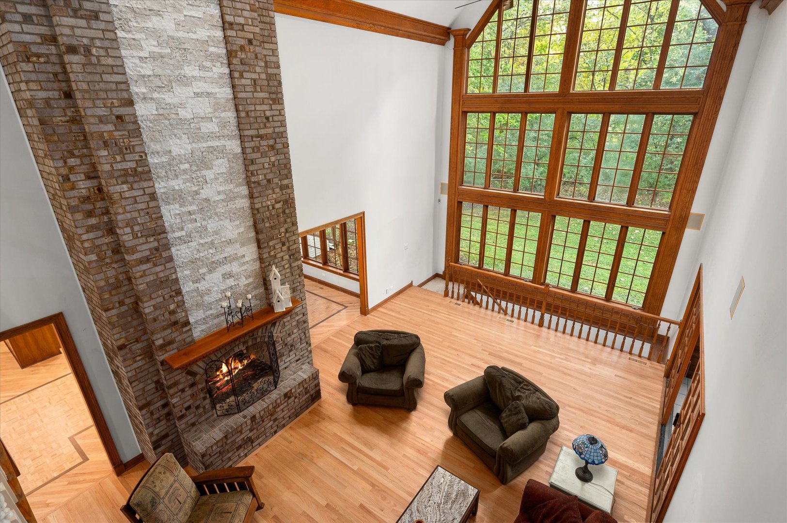 5N847 Surrey Road Wayne, IL 60184 - Photo 26 of 45 a living room with furniture and a floor to ceiling window