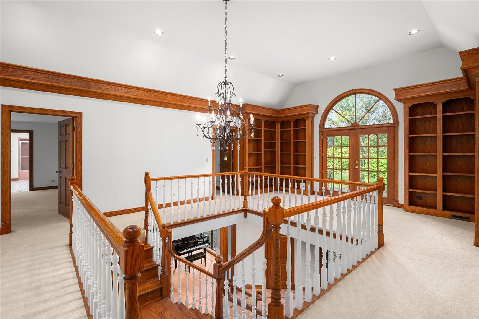 5N847 Surrey Road Wayne, IL 60184 - Photo 27 of 45 a view of staircase with railing and a chandelier
