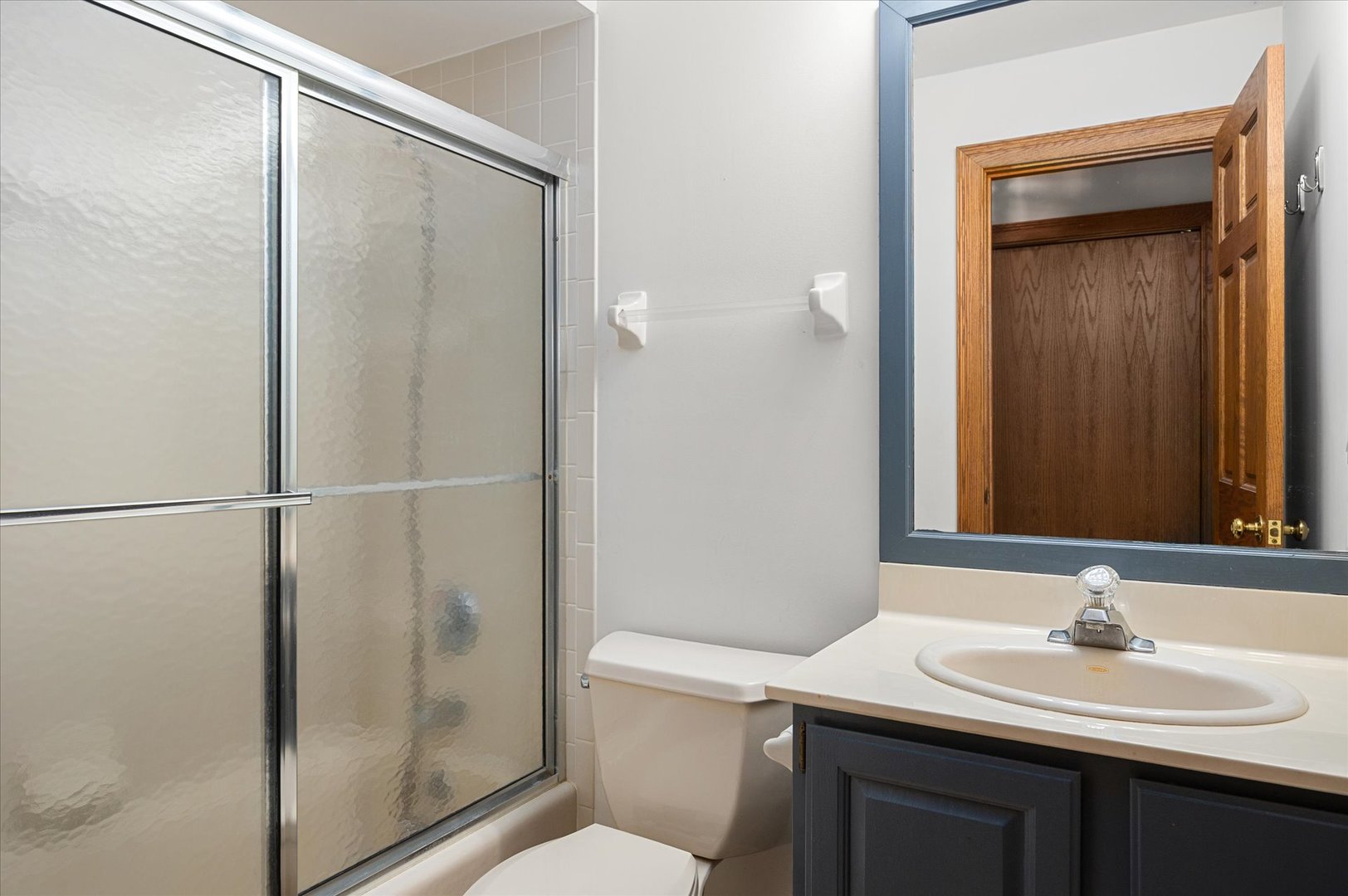 5N847 Surrey Road Wayne, IL 60184 - Photo 31 of 45 a bathroom with a granite countertop sink toilet and shower