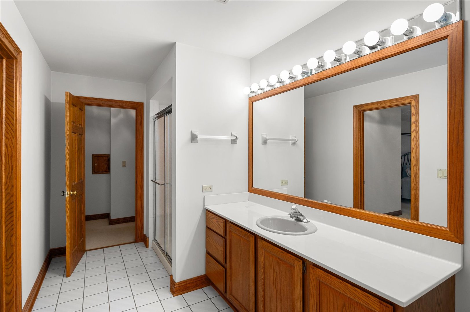 5N847 Surrey Road Wayne, IL 60184 - Photo 35 of 45 a bathroom with a sink double vanity and a mirror