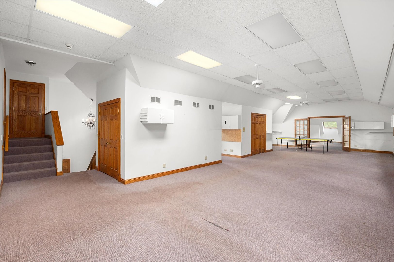 5N847 Surrey Road Wayne, IL 60184 - Photo 37 of 45 a view of a livingroom with furniture and a refrigerator
