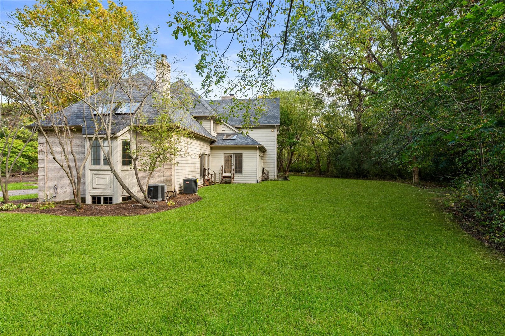 5N847 Surrey Road Wayne, IL 60184 - Photo 40 of 45 a view of a house with a yard