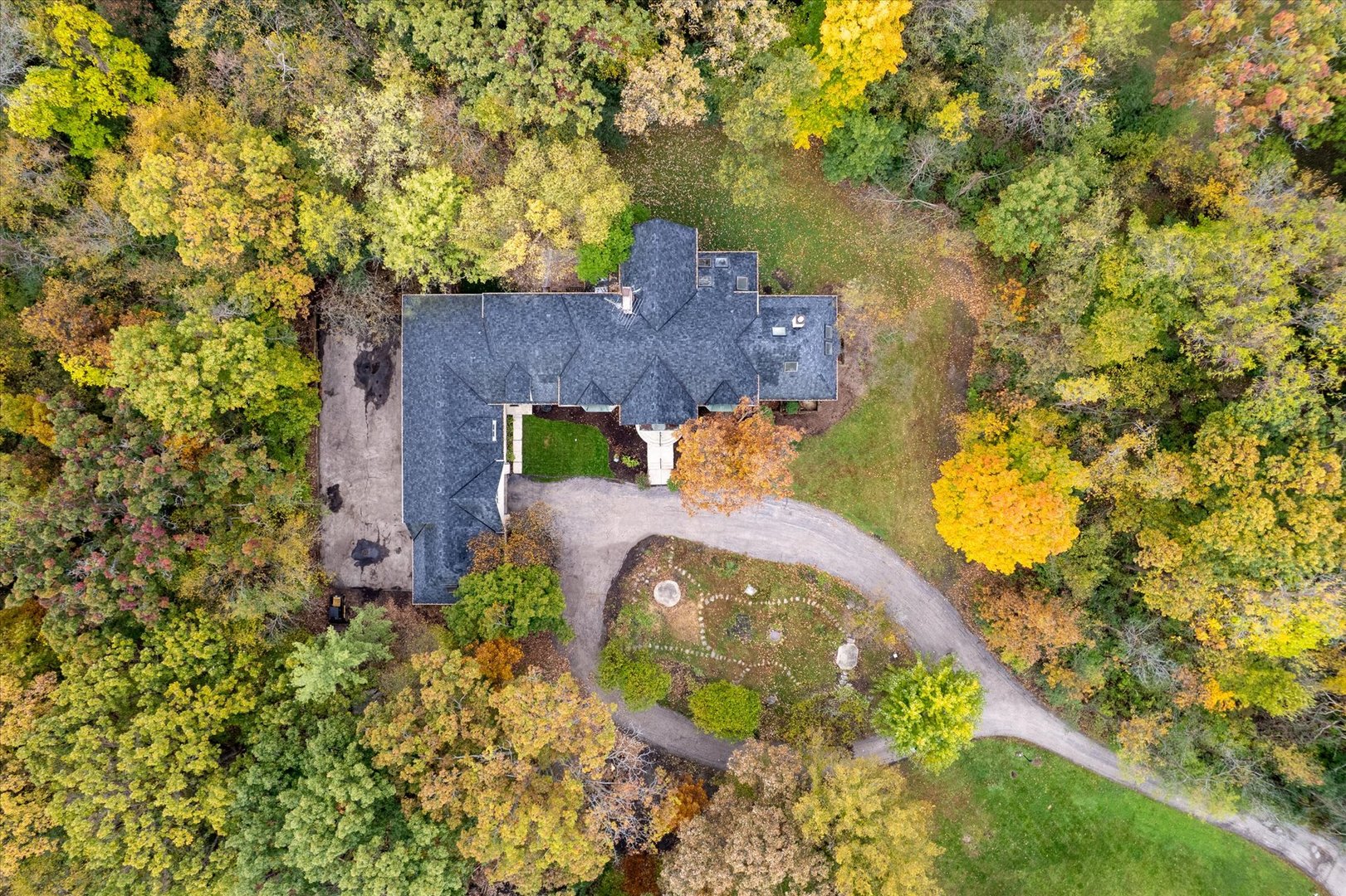5N847 Surrey Road Wayne, IL 60184 - Photo 41 of 45 an aerial view of a house with a yard and large trees