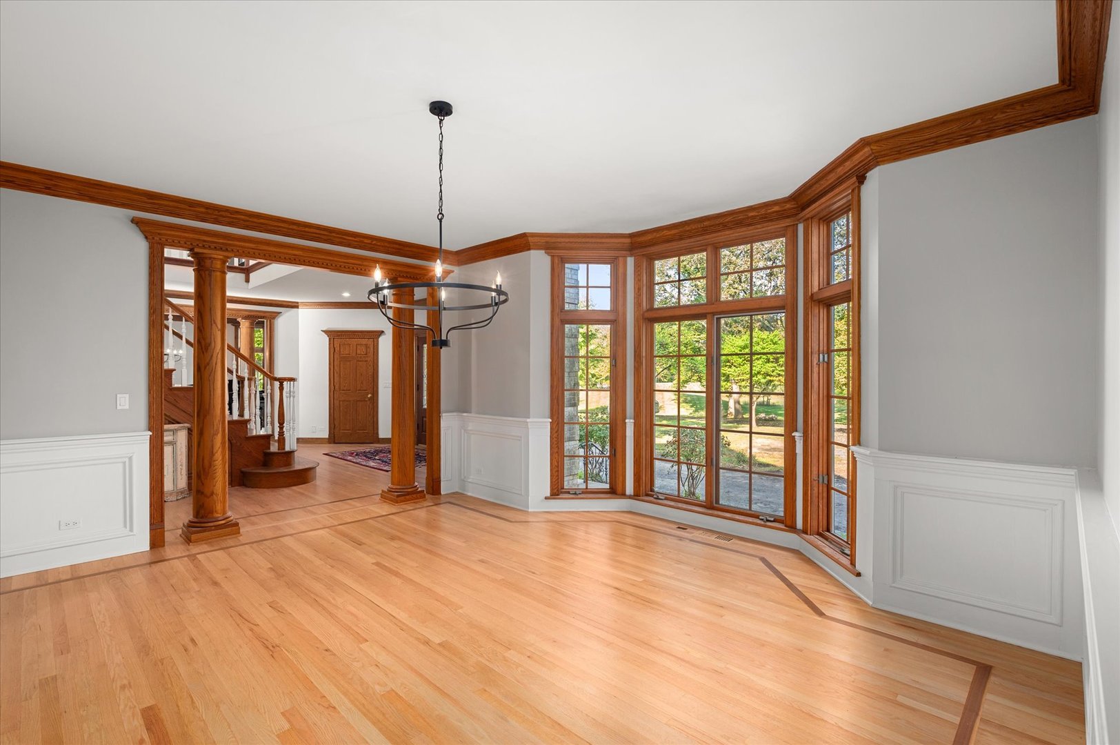 5N847 Surrey Road Wayne, IL 60184 - Photo 5 of 45 a very nice looking room with a large window and chandelier