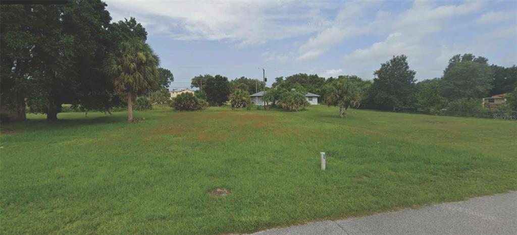 Gisela Rd Port North Port, FL 34287 - Photo 1 of 1 a backyard of a house with lots of green space