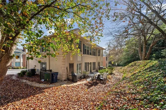 a house with a tree in the background