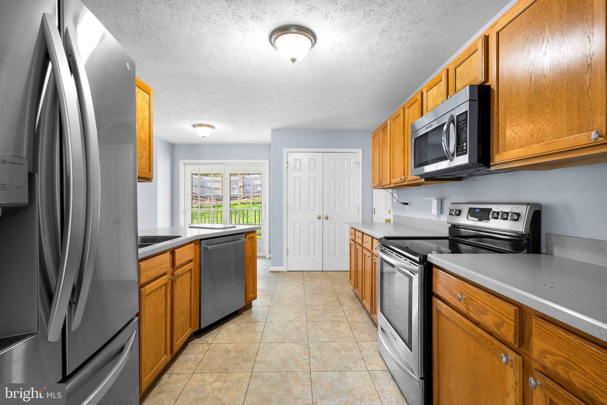 9084 Mullen Road King George, VA 22485 - Photo 15 of 41 Modern kitchen with sleek appliances.