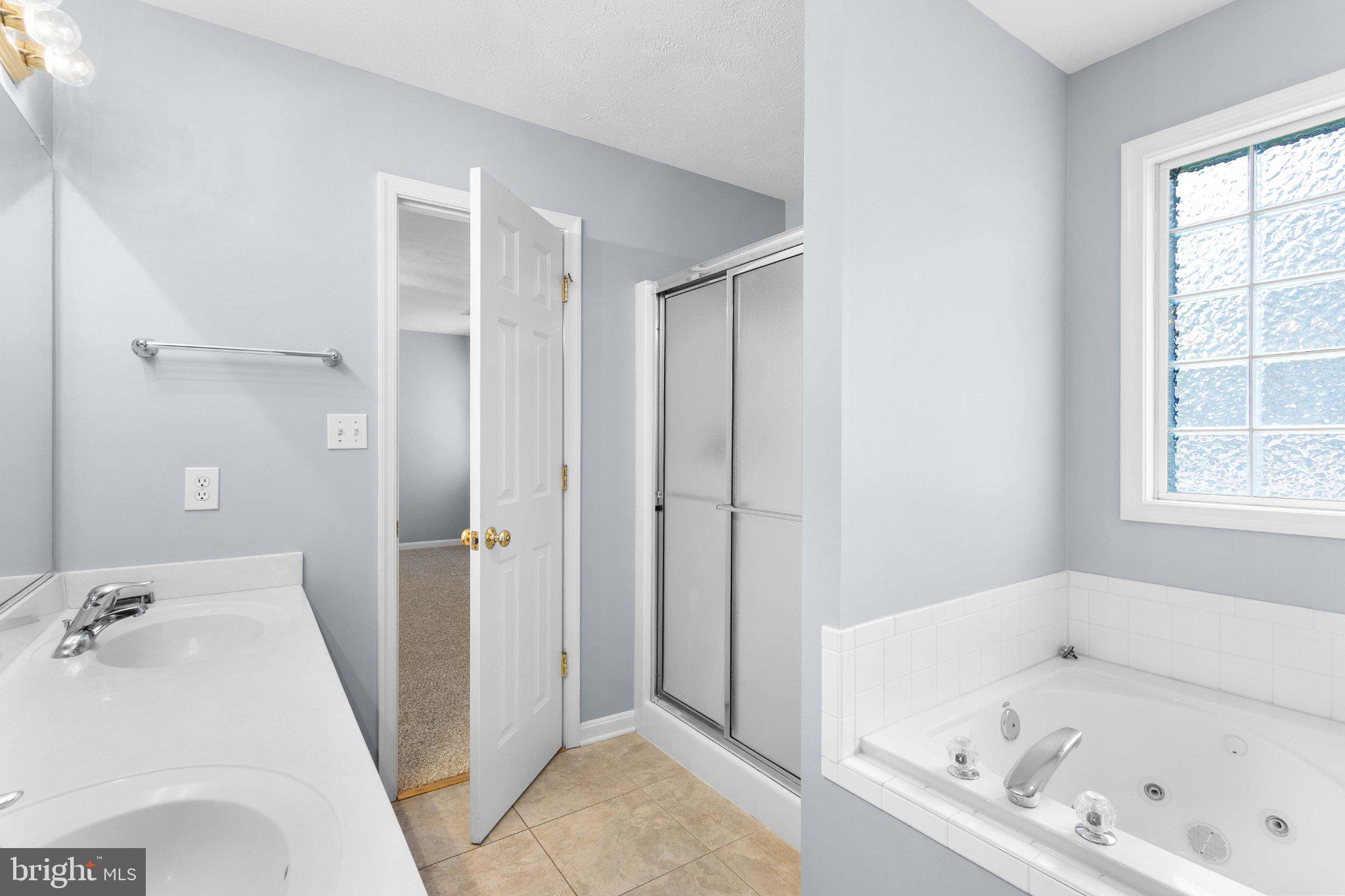 9084 Mullen Road King George, VA 22485 - Photo 41 of 41 Serene bathroom with modern fixtures.