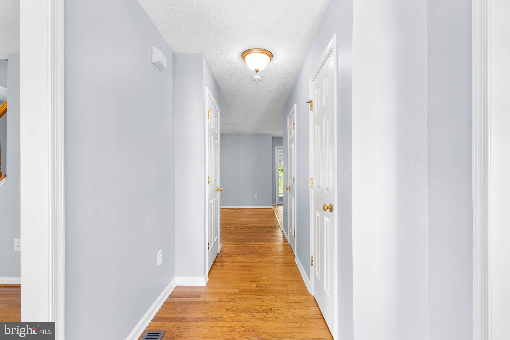 9084 Mullen Road King George, VA 22485 - Photo 5 of 41 Bright and inviting hallway retreat.