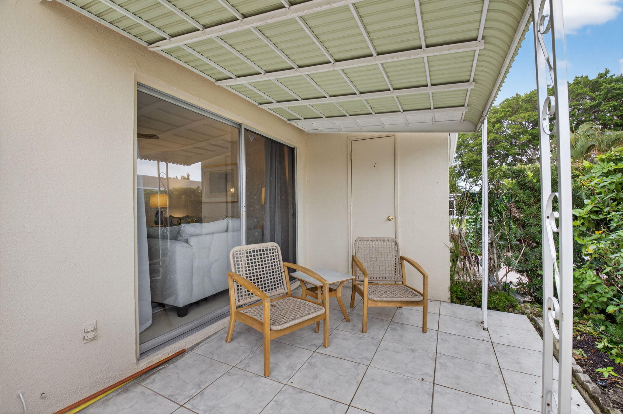 8633 Chevy Chase Drive Boca Raton, FL 33433 - Photo 24 of 43 a outdoor living space with furniture