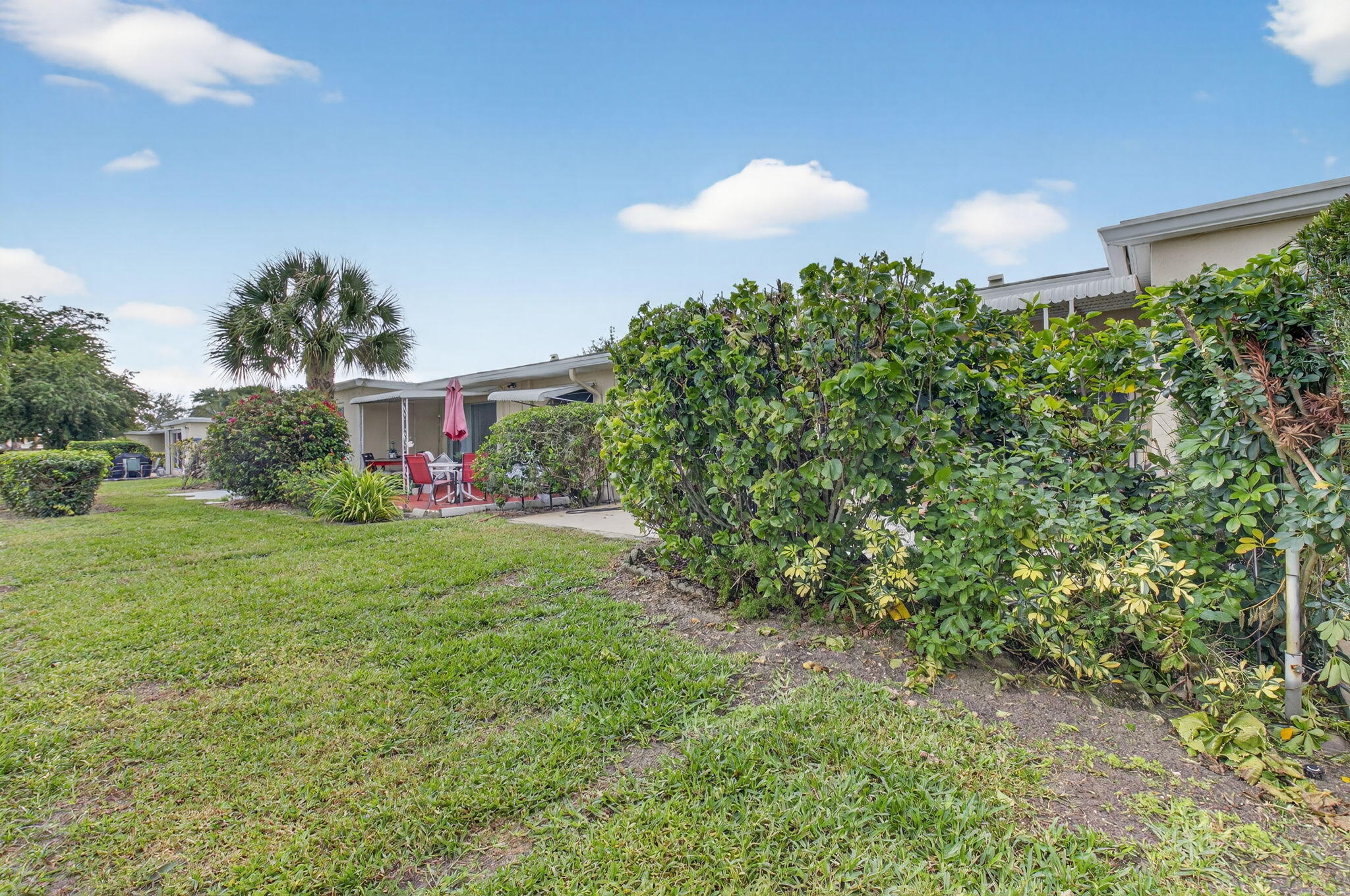 8633 Chevy Chase Drive Boca Raton, FL 33433 - Photo 25 of 43 a view of a backyard