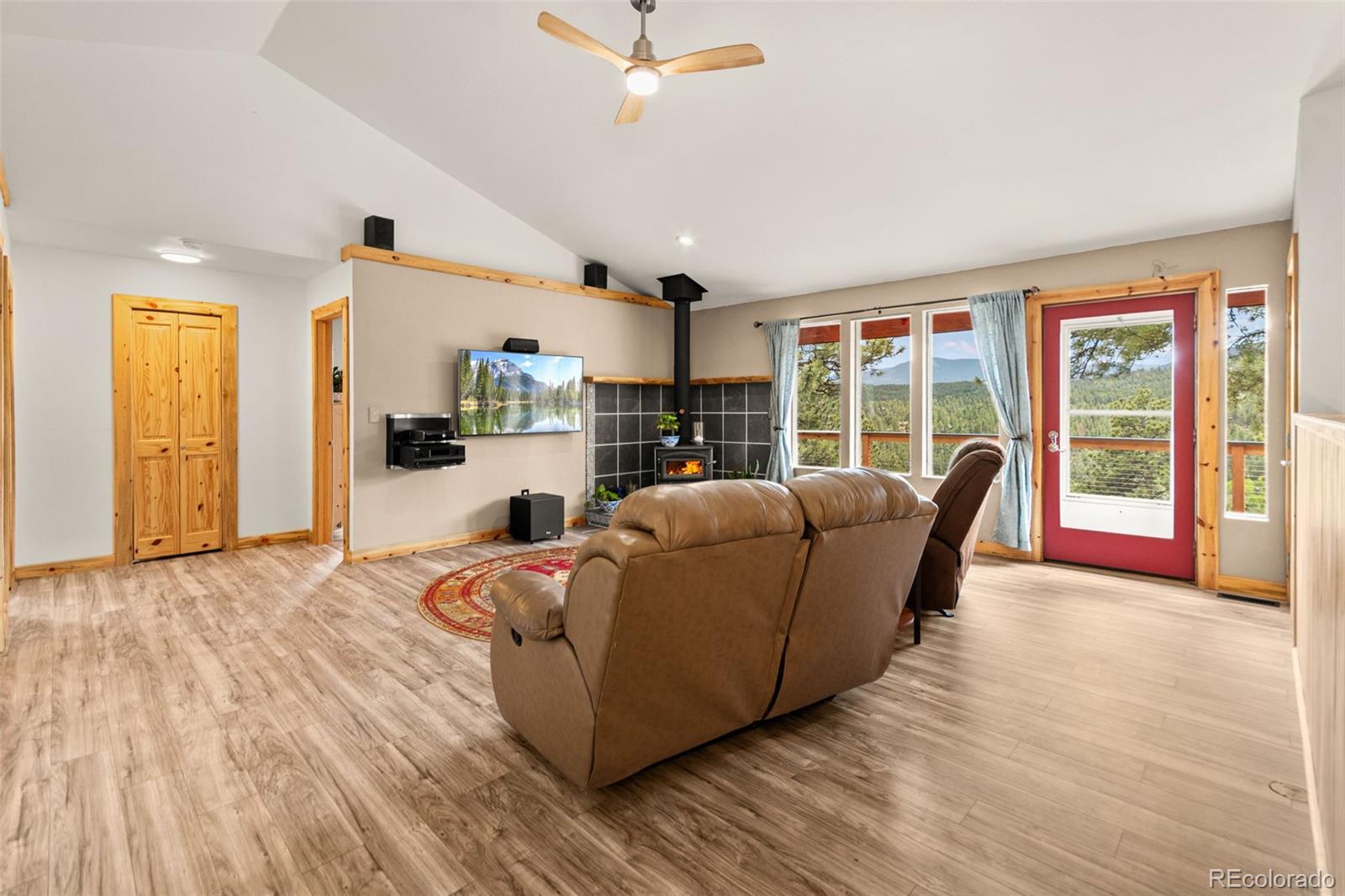 202 Badger Lane Bailey, CO 80421 - Photo 16 of 50 a living room with furniture and a large window